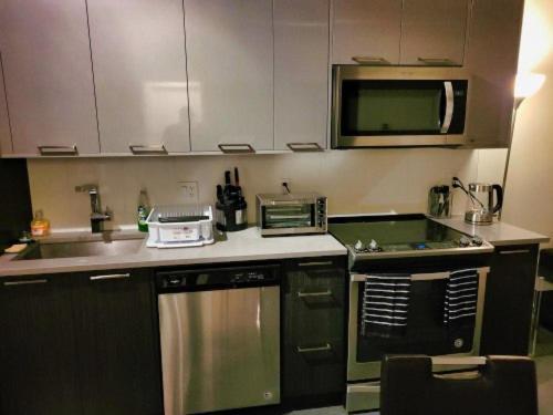 Furnished 1 Bedroom In East Village By Signature Suites Ltd YYC Esterno foto